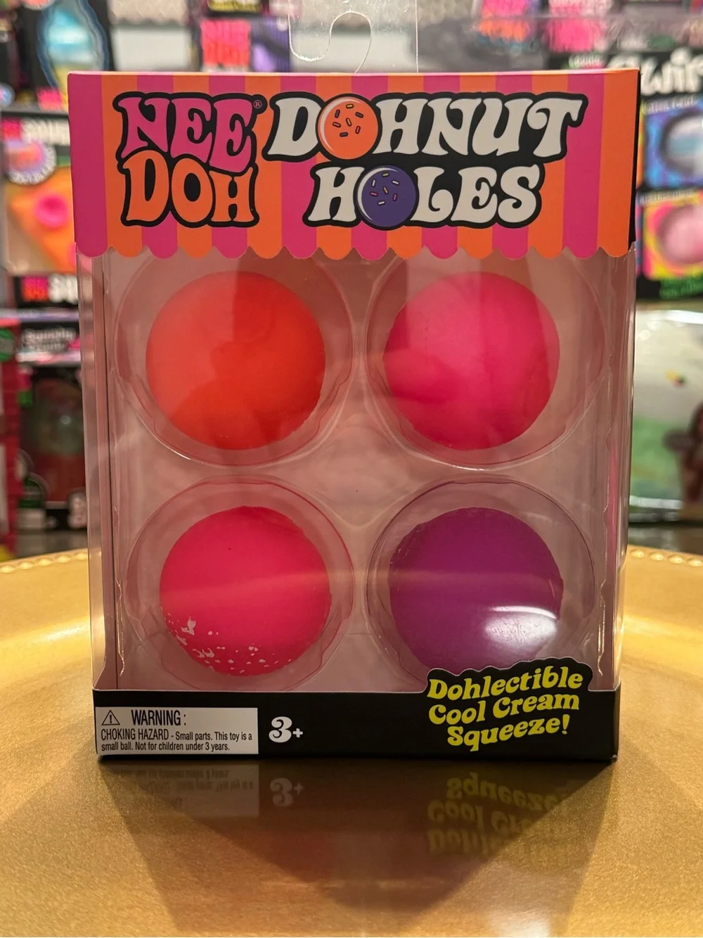 Nee Doh Donut Holes Squeeze Pack — Pink, Hot Pink, Orange, Purple